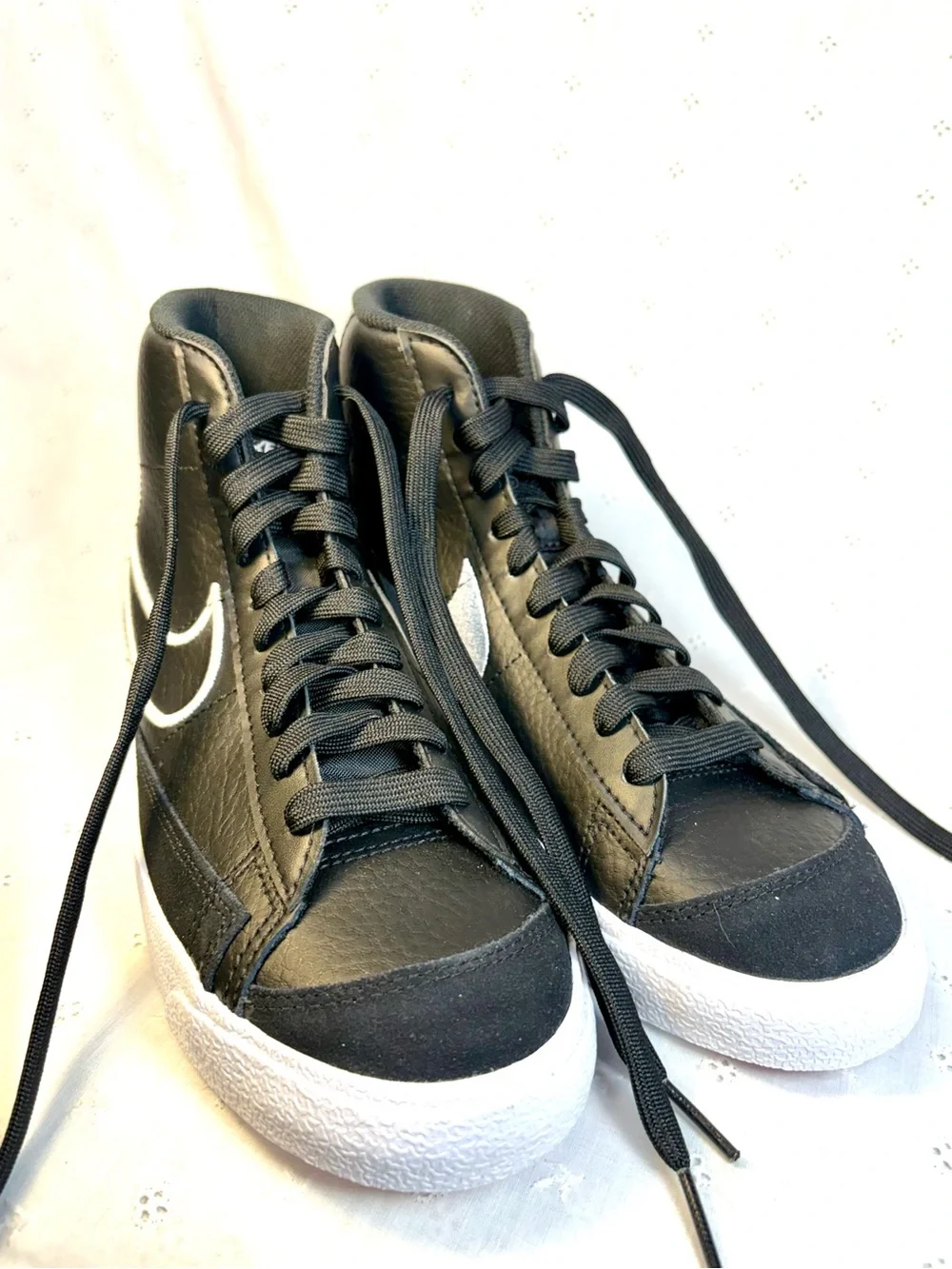 Nike Black High-Top Sneakers with White Tongue Text